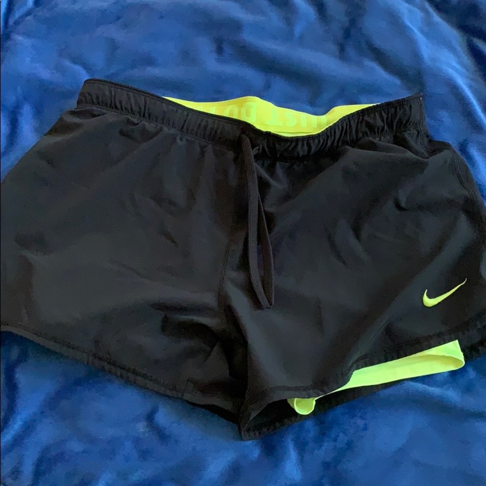 Neon yellow and black Nike running shorts